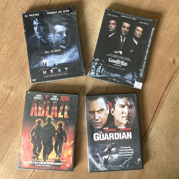 Four DVD movies New and sealed are Heat and Goodfellas Ablaze and Guardian used. - Picture 1 of 2